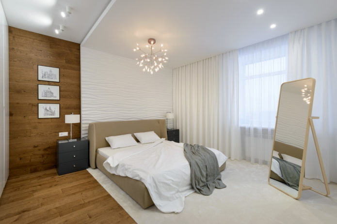 interno della camera da letto nei toni del bianco e del marrone