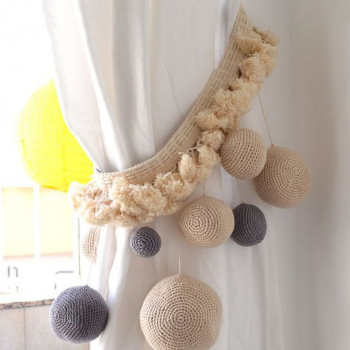 Fermatende con pompon