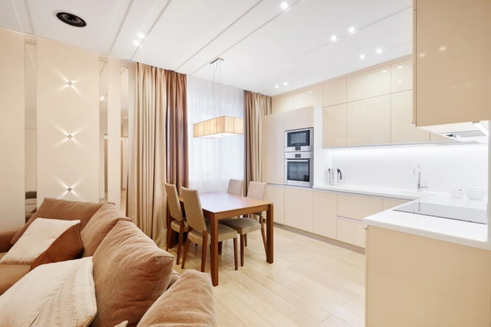 illuminazione e decorazioni per l'interno della cucina nei toni del beige