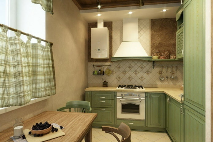 interno della cucina nei toni del beige e del verde