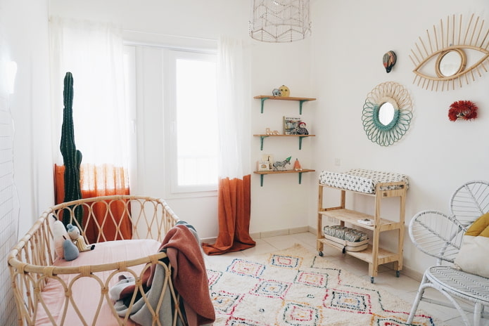 una cameretta per un neonato in stile boho