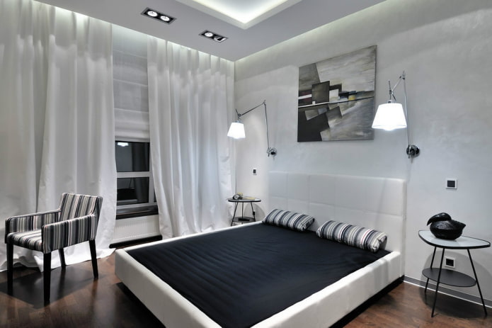Arredamento e illuminazione della camera da letto in bianco e nero