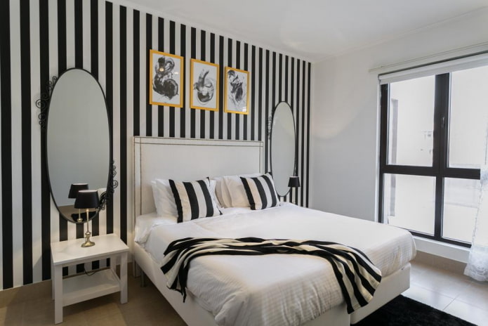 Arredamento e illuminazione della camera da letto in bianco e nero