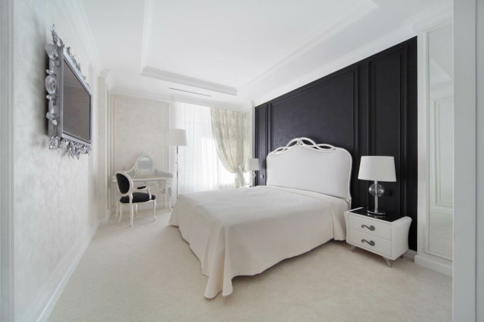 interno di una camera da letto in bianco e nero in stile classico