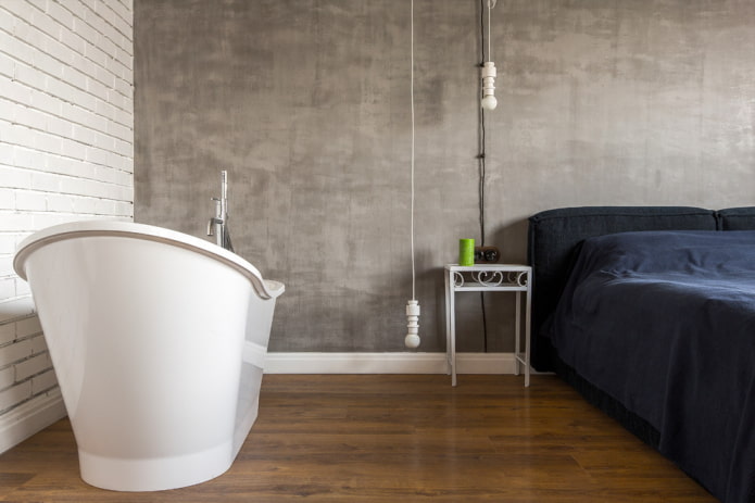 intonaco grigio nell'interno della camera da letto