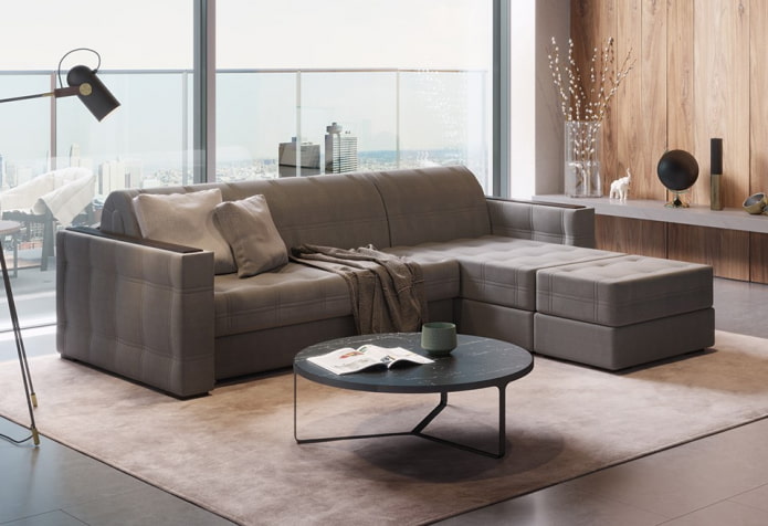 divano pieghevole con un pouf all'interno