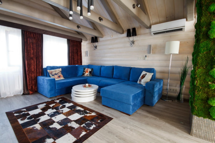 modello di divano angolare con pouf all'interno