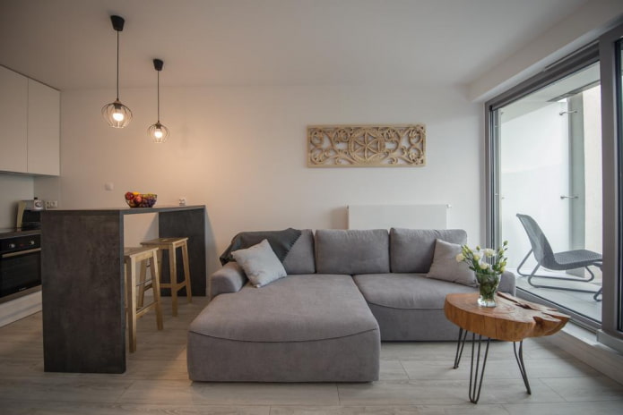 modello di divano con pouf all'interno