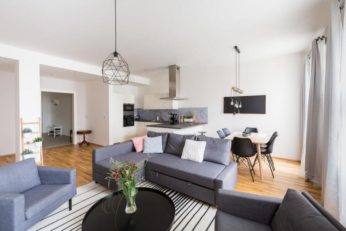 modello di divano con pouf all'interno