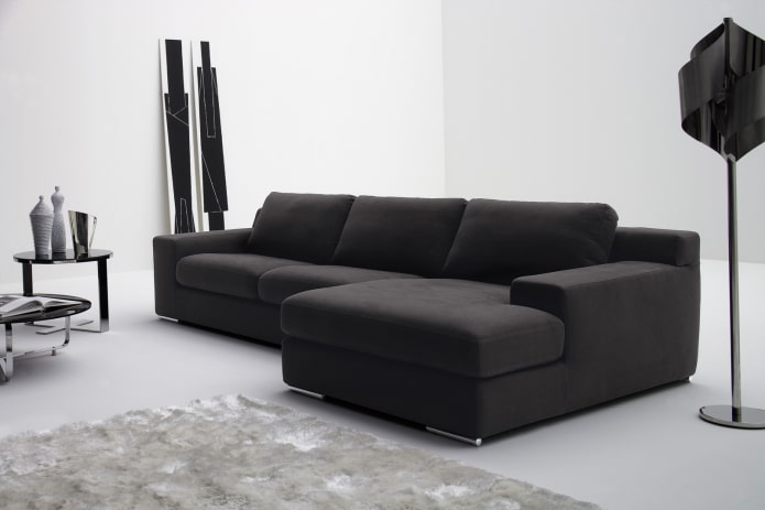 modello di divano con pouf in stile minimalista