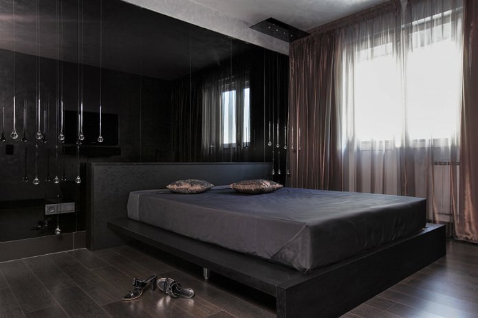 mobili nell'arredamento della camera da letto nei toni neri