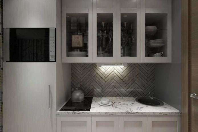foto del design della cucina nel monolocale di 14 mq.