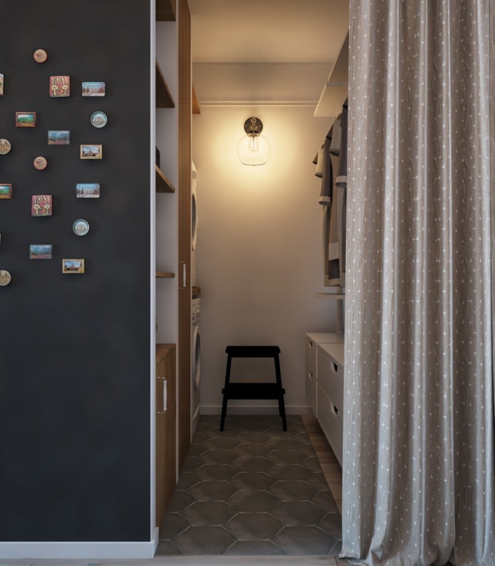 Progetto di uno spogliatoio in un monolocale con un design a battente