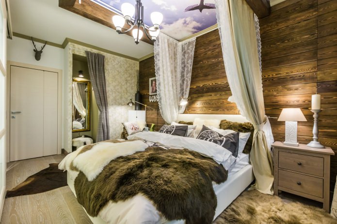 Camera da letto con parete in legno
