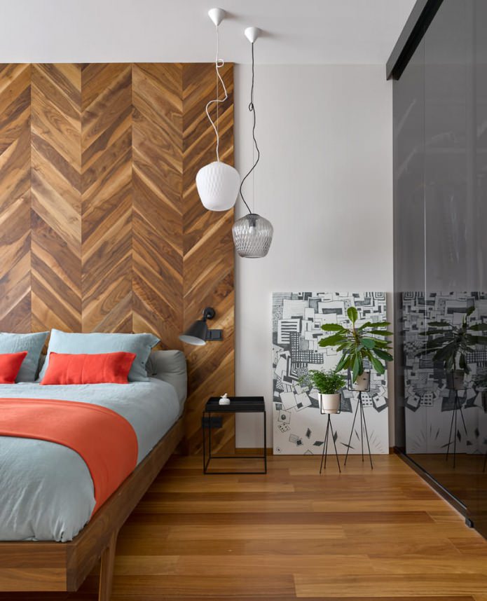 Camera da letto con parete in legno