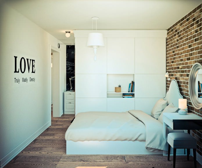 Camera da letto nel progetto di un monolocale angolare di 32 mq.