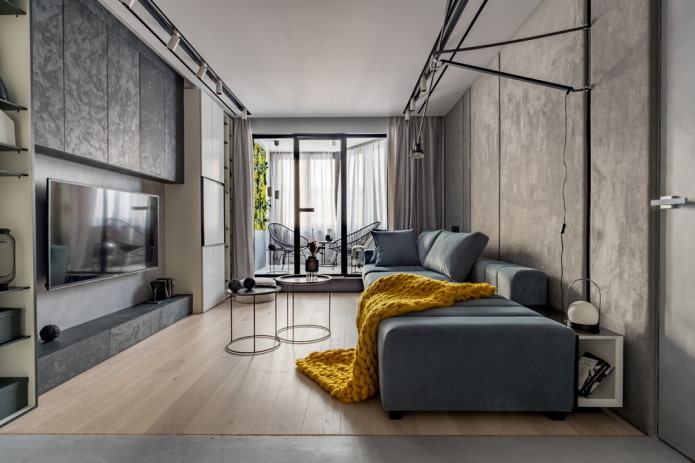Soggiorno grigio con una coperta luminosa