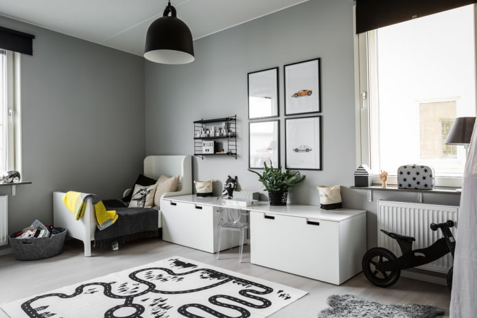 mobili e decorazioni per l'interno di una cameretta grigia