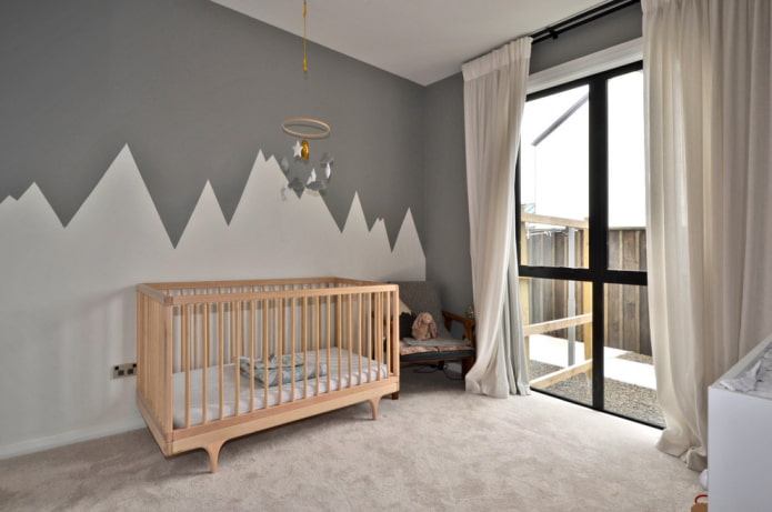 interno di una cameretta per bambini beige e grigia