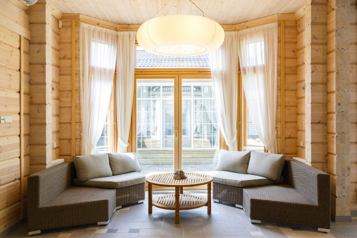 design del soggiorno all'interno di una casa in tronchi