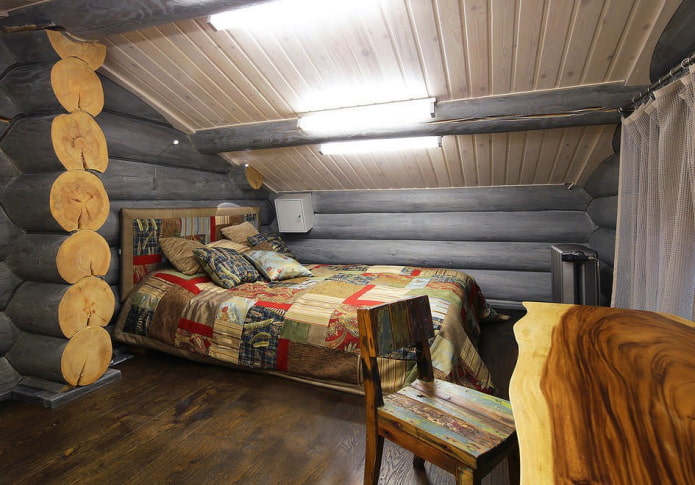 design della camera da letto all'interno di una casa in tronchi