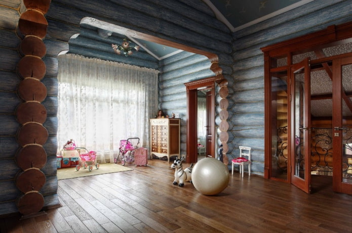 cameretta per bambini in una casa di legno