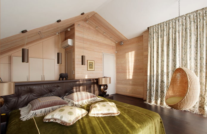 design della camera da letto all'interno di una casa in tronchi