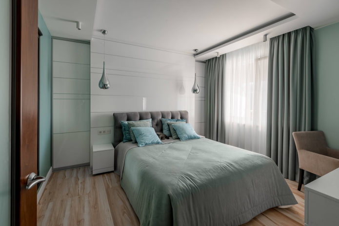 Camera da letto in fredde tonalità menta