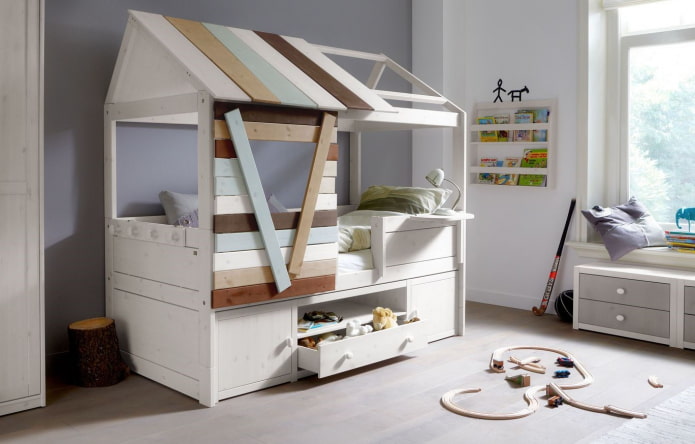 letto a forma di casa con cassetti nella cameretta dei bambini