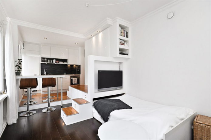 letto su un podio nell'interno della cucina