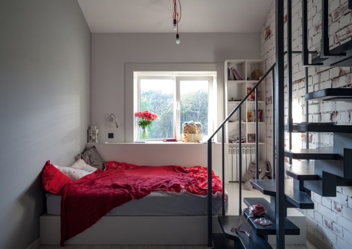 letto in un piccolo appartamento a due piani