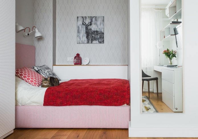 quadro in una nicchia con un letto all'interno