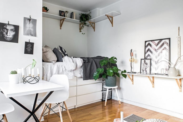 nicchia con letto in un interno in stile scandinavo
