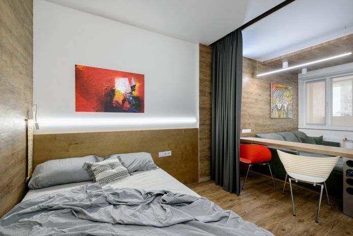 letto e divano in un monolocale