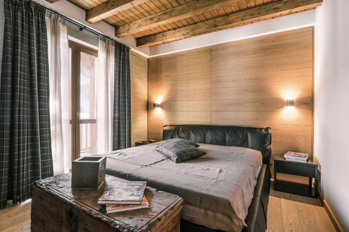 letto nero nell'interno della camera da letto
