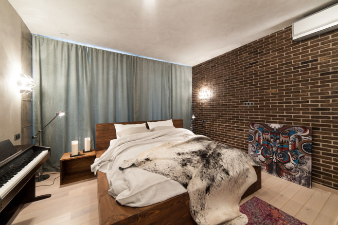 letto in un interno in stile loft