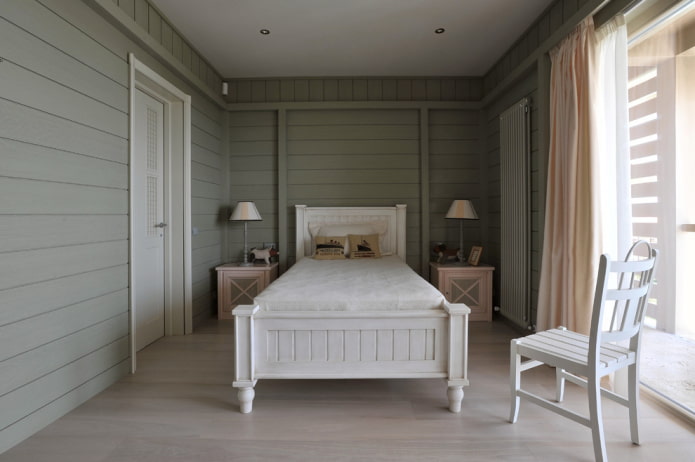 letto in legno su gambe all'interno