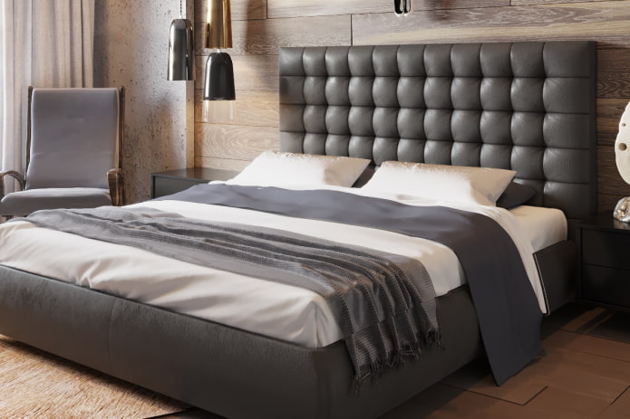 letto con testiera trapuntata all'interno