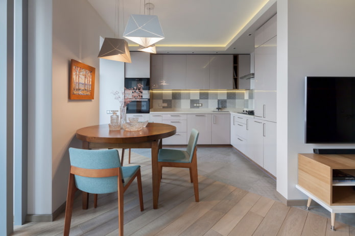 tavolo rotondo marrone nell'interno della cucina