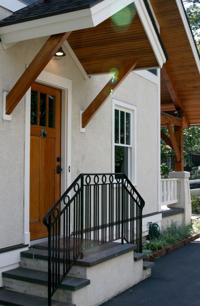 casa con portico a due falde