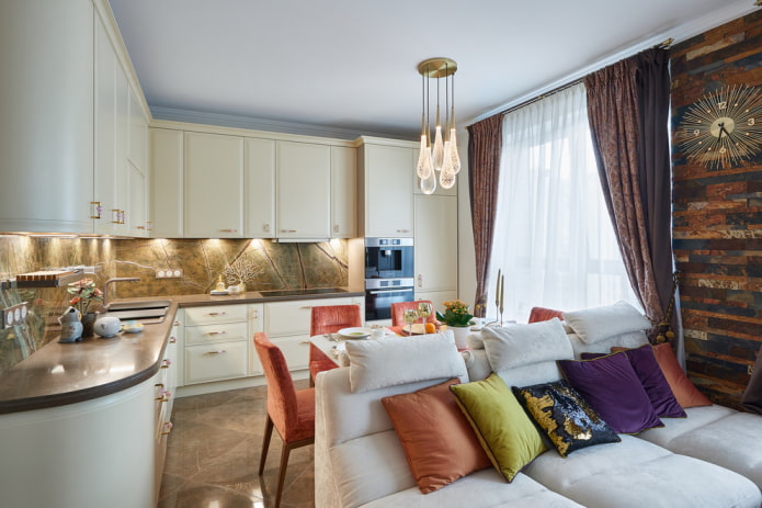 Cucina ad angolo, tavolo e zona soggiorno