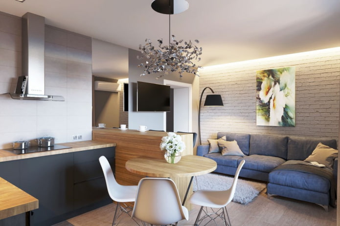 divano all'interno della cucina-soggiorno