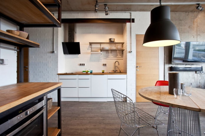 cucina in una nicchia in un interno in stile loft