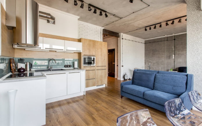 divano nell'arredamento della cucina in stile loft