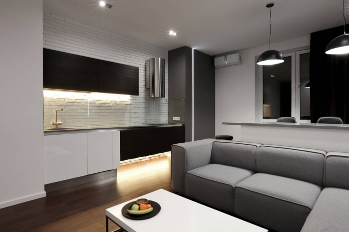 divano nell'interno della cucina in stile minimalista