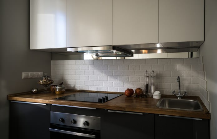 moderno set da cucina con piano di lavoro in pannello MDF