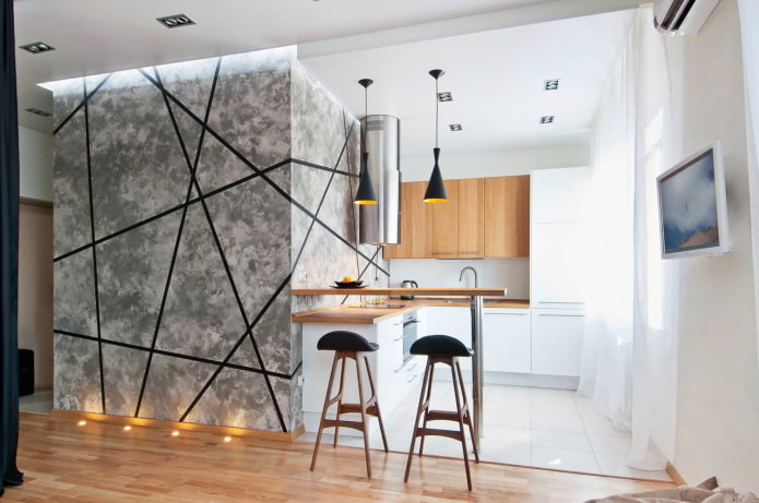 interno di una cucina-studio con bancone del bar