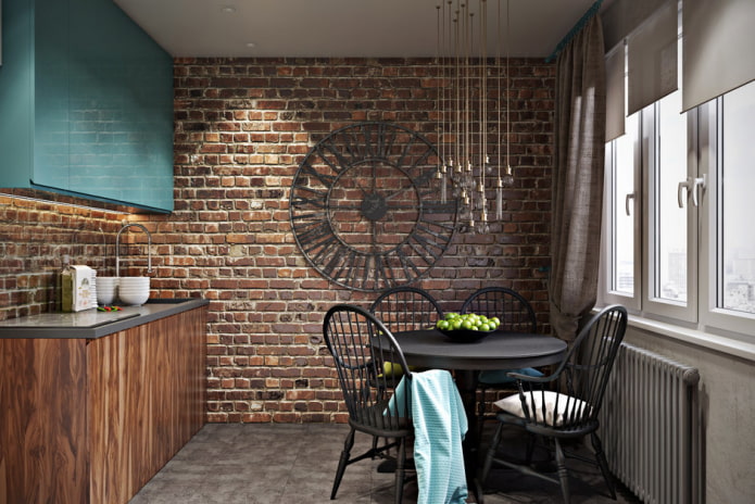 cucina molto piccola con mobili in legno e una parete decorativa in mattoni