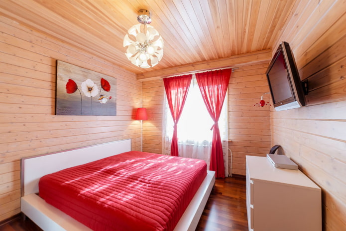 lampadario sul soffitto nell'interno della camera da letto