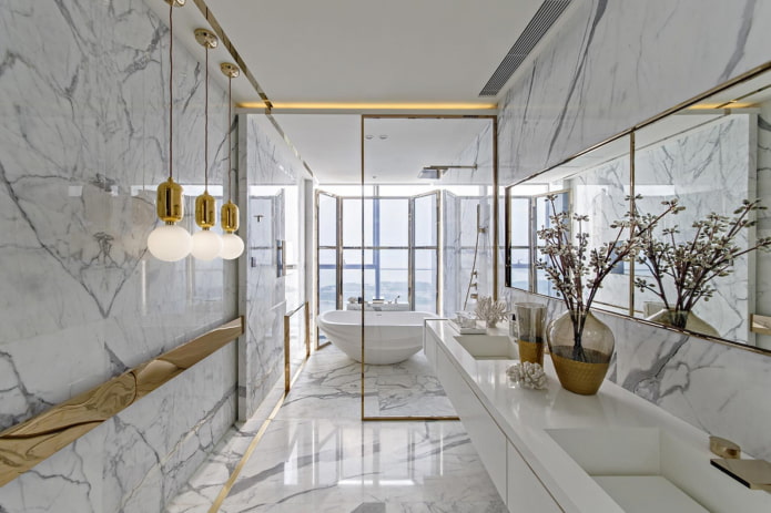 finiture bagno marmo e oro